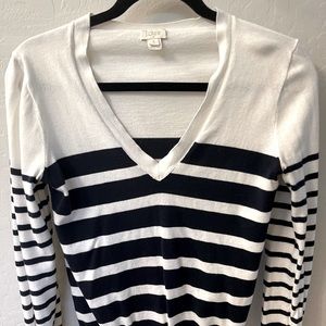 Navy and white striped V-neck sweater